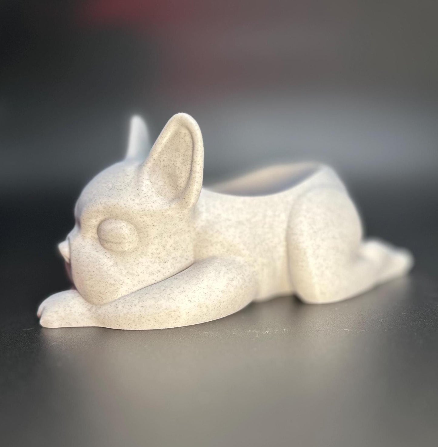 3D-printed French Bulldog planter for succulents or small plants. Available in black, chocolate brown, beige, white, gray, and marble colors.