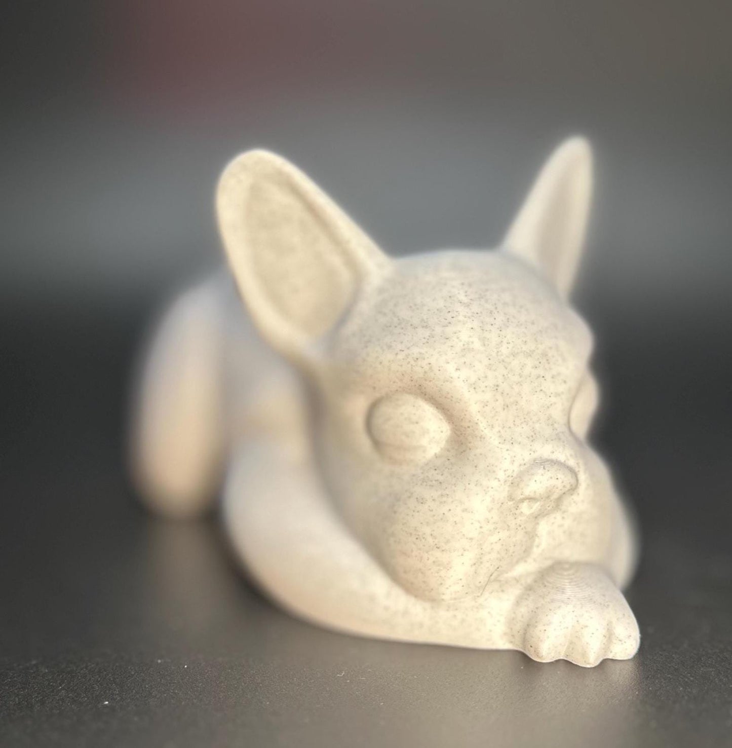 3D-printed French Bulldog planter for succulents or small plants. Available in black, chocolate brown, beige, white, gray, and marble colors.