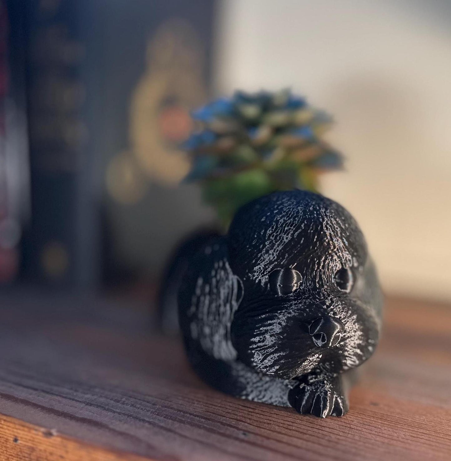 Cute 3D-printed poodle planter for succulents or small plants. Available in six colors: black, chocolate brown, beige, white, gray, and marble.