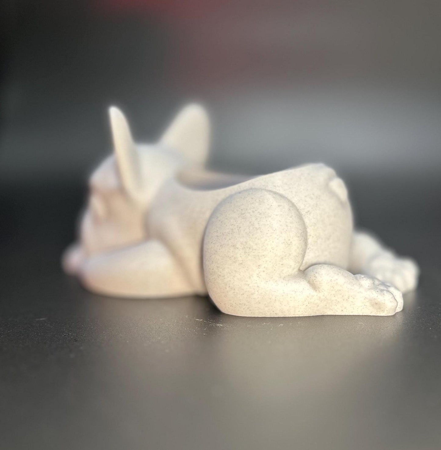 3D-printed French Bulldog planter for succulents or small plants. Available in black, chocolate brown, beige, white, gray, and marble colors.