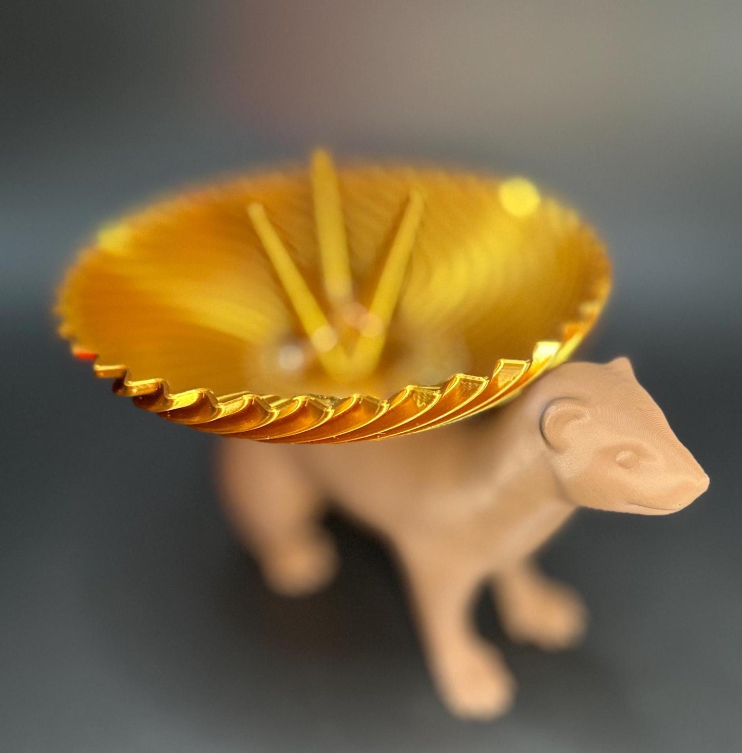 Adorable ferret figurine with a decorative dish on its back for holding rings, necklaces, and accessories. A unique jewelry organizer.