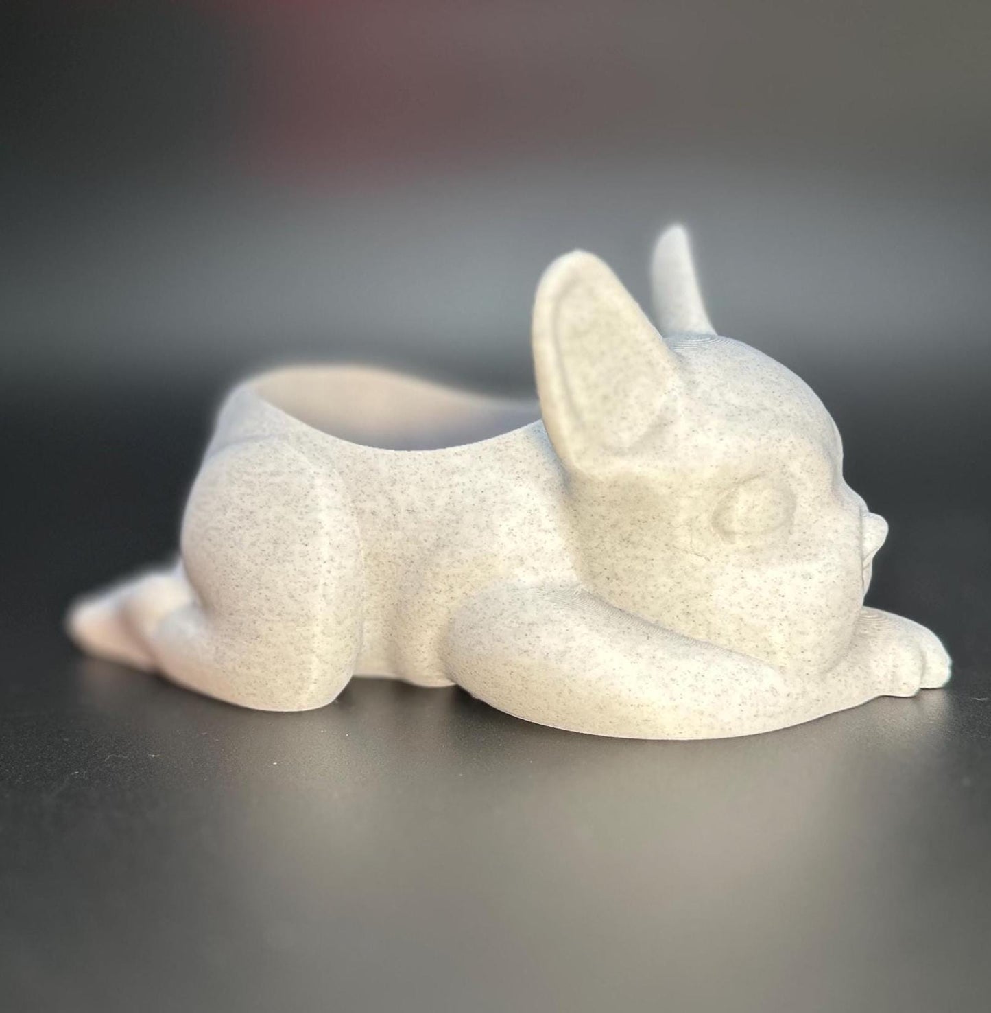 3D-printed French Bulldog planter for succulents or small plants. Available in black, chocolate brown, beige, white, gray, and marble colors.