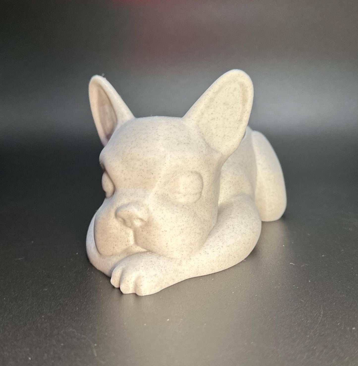 3D-printed French Bulldog planter for succulents or small plants. Available in black, chocolate brown, beige, white, gray, and marble colors.