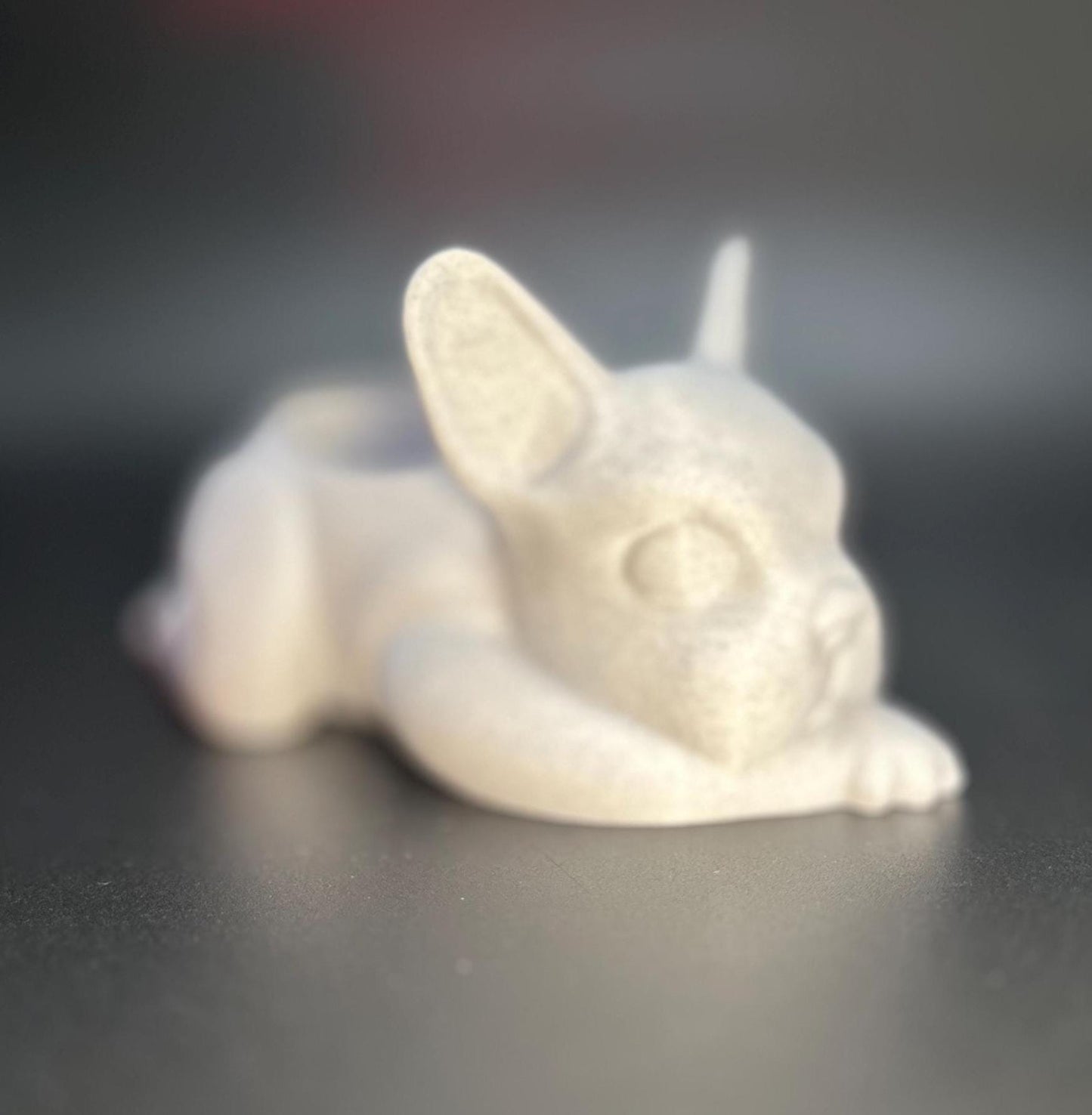 3D-printed French Bulldog planter for succulents or small plants. Available in black, chocolate brown, beige, white, gray, and marble colors.
