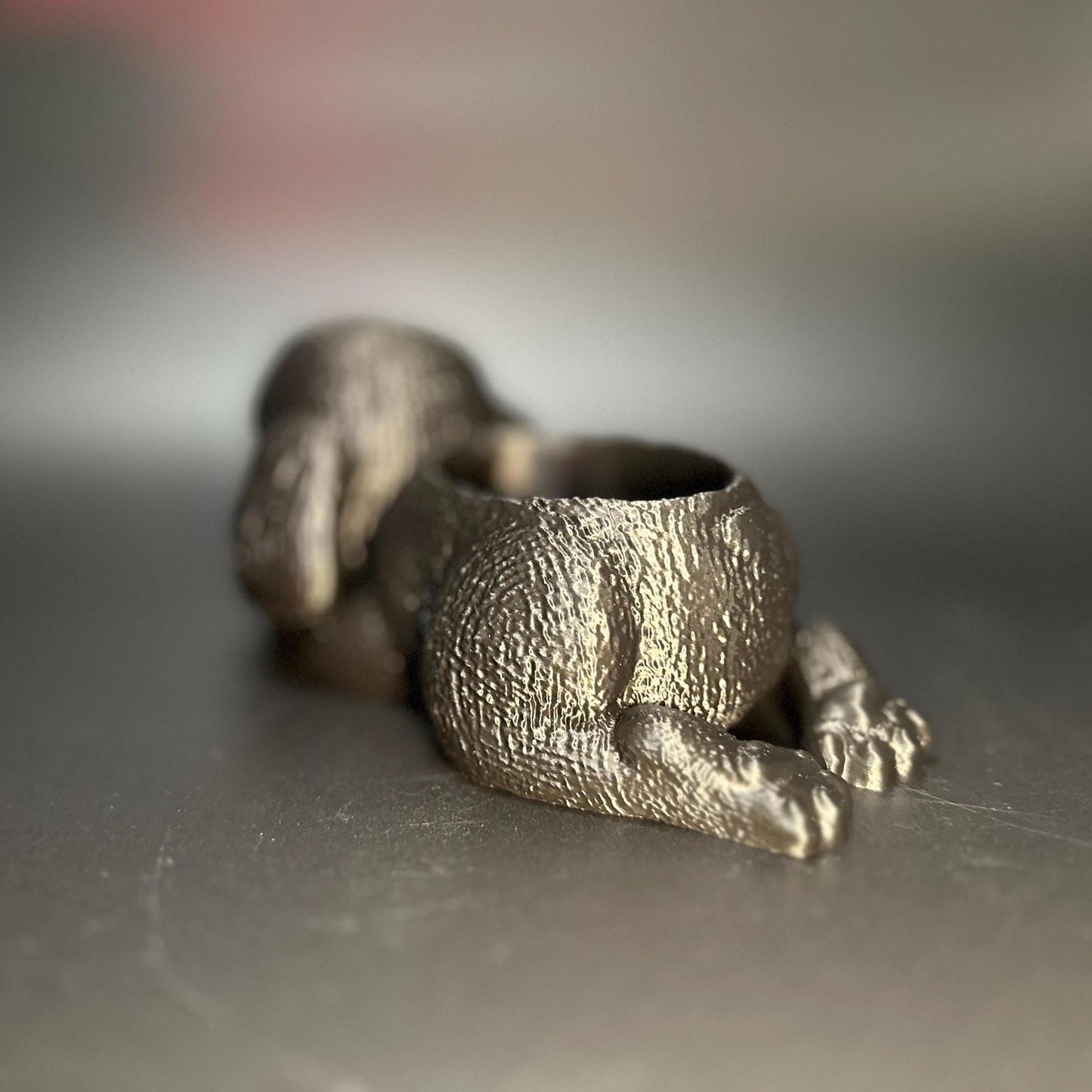 Cute 3D-printed poodle planter for succulents or small plants. Available in six colors: black, chocolate brown, beige, white, gray, and marble.