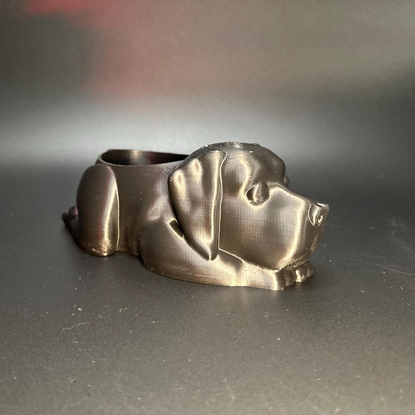 3D-printed black Labrador planter for succulents or small plants, showing off cute canine details and a sleek design.