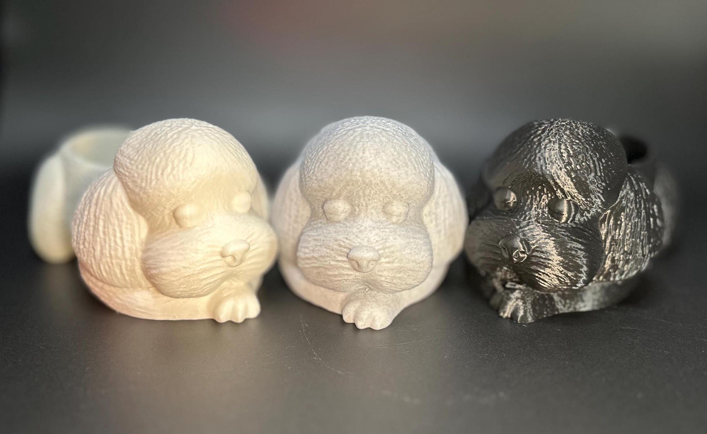 Cute 3D-printed poodle planter for succulents or small plants. Available in six colors: black, chocolate brown, beige, white, gray, and marble.