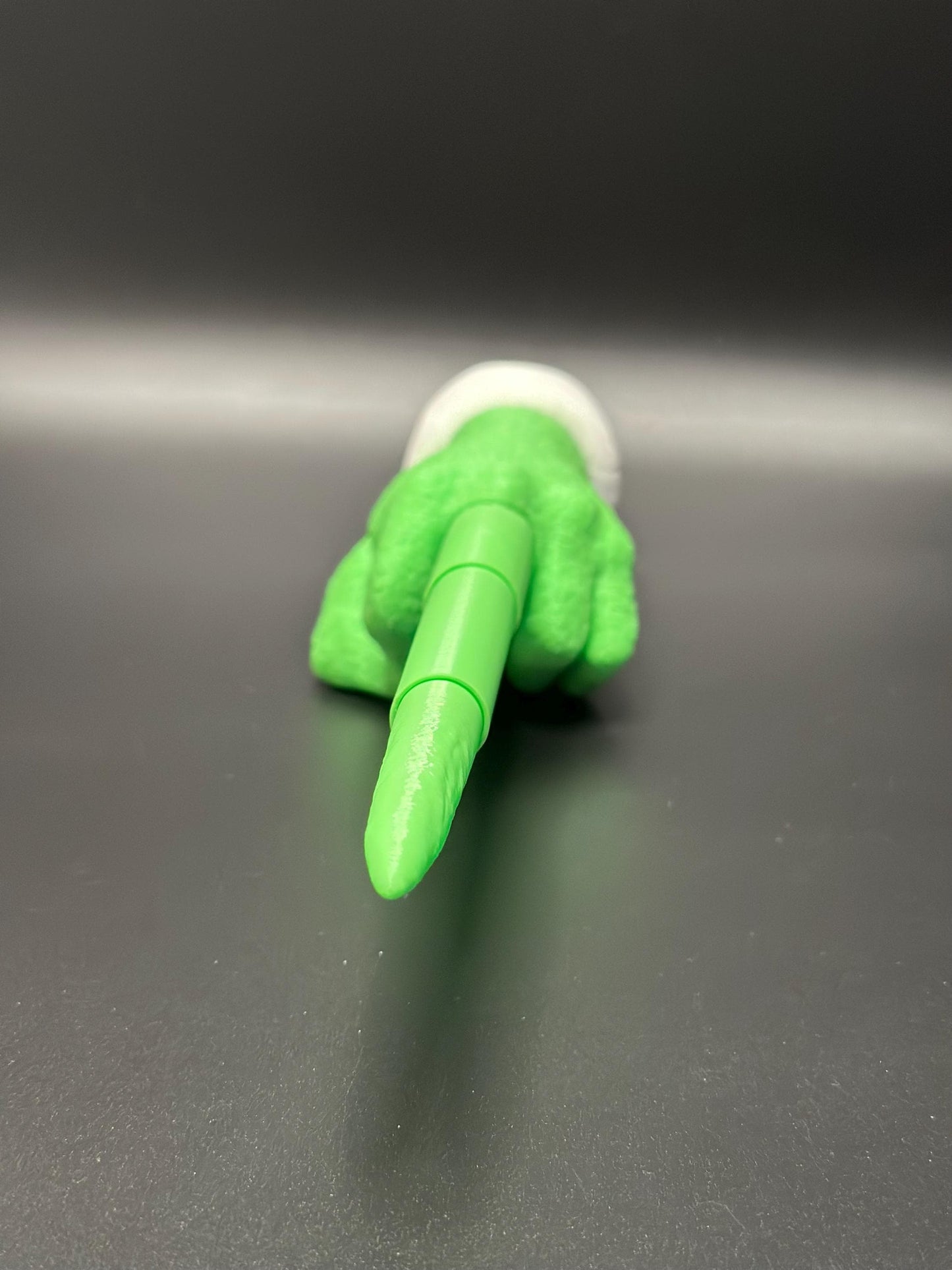 Hilarious Grinch Hand Toy Gift for Festive Desk Entertainment